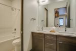 Full bathroom for 4th bedroom in suite